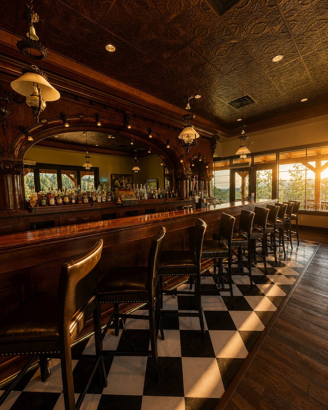The restored 1897 cherrywood bar inside the 77 Steakhouse and Saloon at The Golf Club at Devils Tower