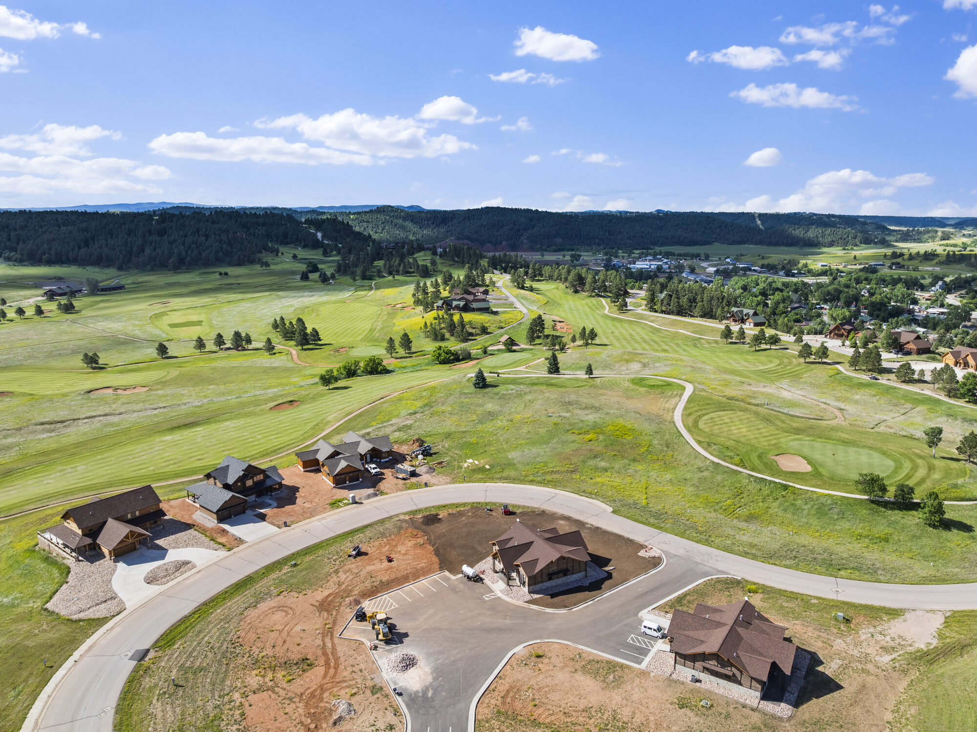 Aerial view of the golf course and log-home community at The Golf Club at Devils Tower in Hulett, Wyoming