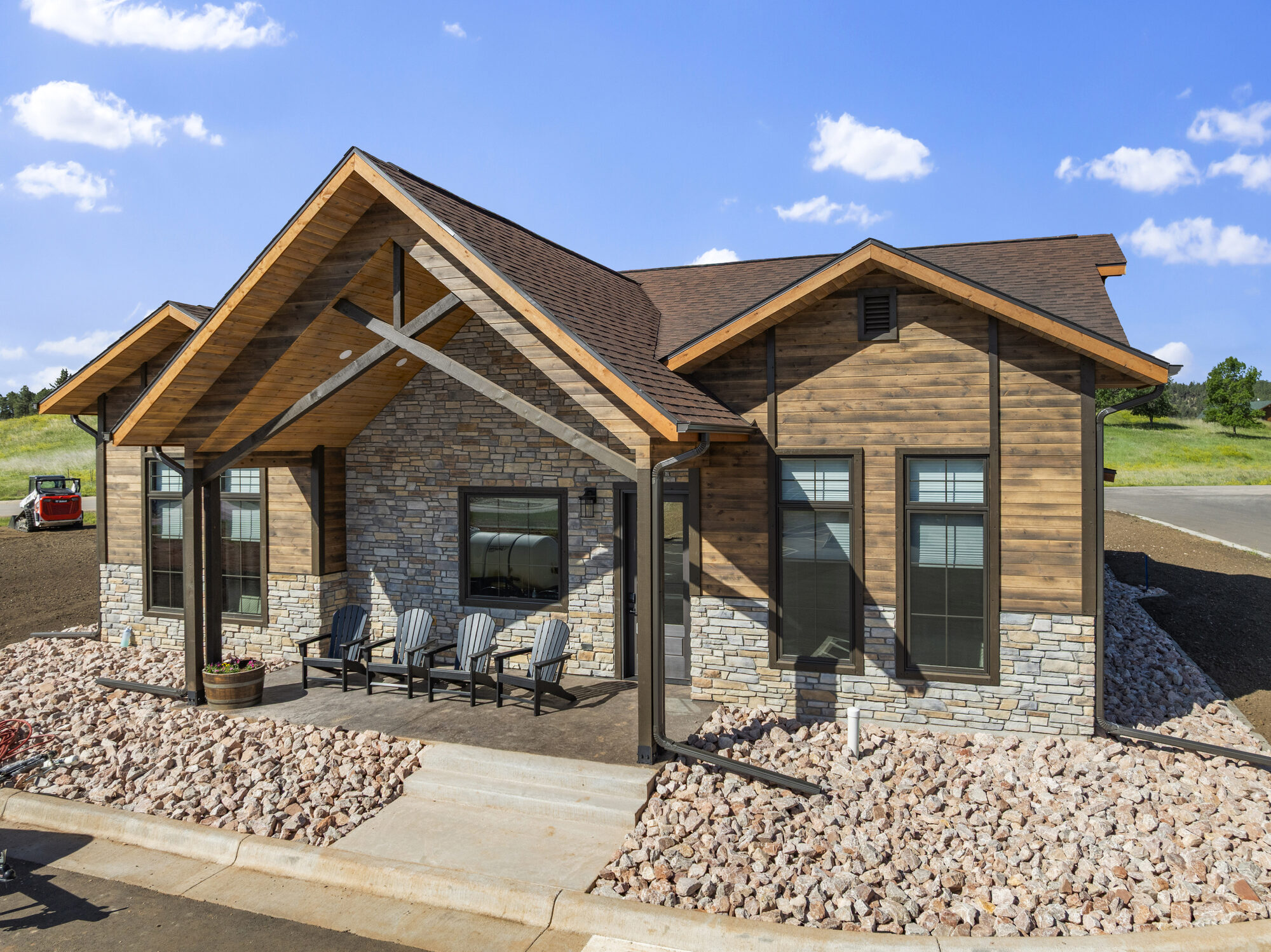 A stone-and-timber home in the log-home community at The Golf Club at Devils Tower, Hulett, Wyoming